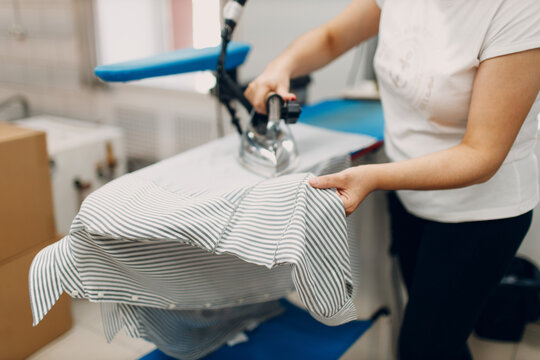 Dry Cleaning Clothes. Clean Cloth Chemical Process. Laundry Industrial Dry-cleaning Factory