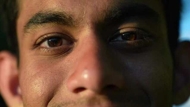Close up portrait of young man from Sri Lanka looking directly into the camera