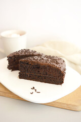 Chocolate cake slices on white background