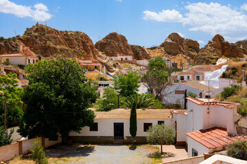 Troglodyte cave-house in Guadix, Andalucia, in the south of Spain - Underground dwelling in a desert landscape, dug out in the muddy hills of the Barrio de Cuevas