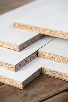 White melamine stack in kitchen furniture factory