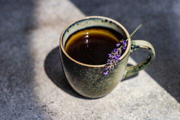 Ceramic cup of coffee with lavender