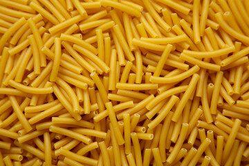 Dry Organic Maccheroni Pasta in a Bowl, top view. Flat lay, overhead, from above.