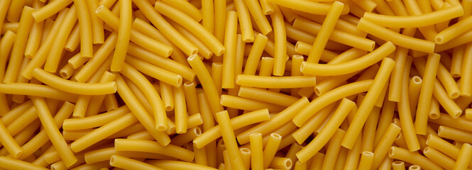 Dry Organic Maccheroni Pasta, top view. Flat lay, overhead, from above.