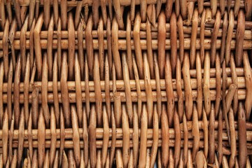 Rattan wicker basket macro textured abstract background. Eco friendly handmade natural home...
