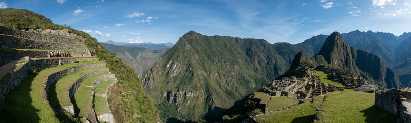 The old ruins of Machu Picchu in the Sacred Valley of Urubamba in Peru - obrazy, fototapety, plakaty
