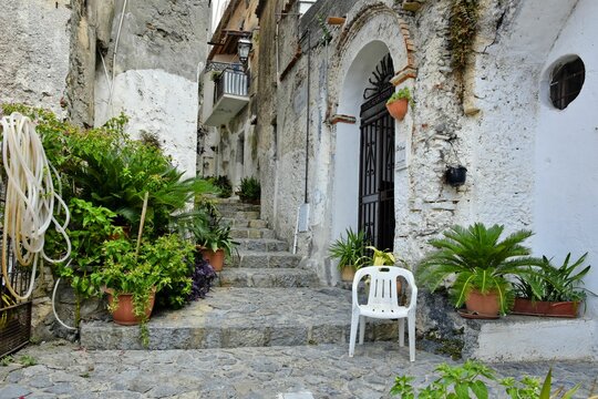Beautiful shot of a narrow street between old houses in Scalea village, the Calabria region, Italy