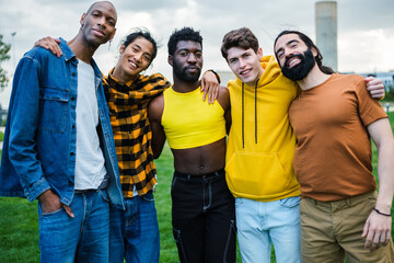 Group of young men together spending time together outdoors