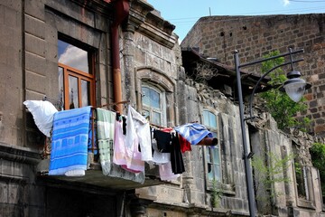 Washed clothes drying outside of an old house in Gyumri, Armenia
