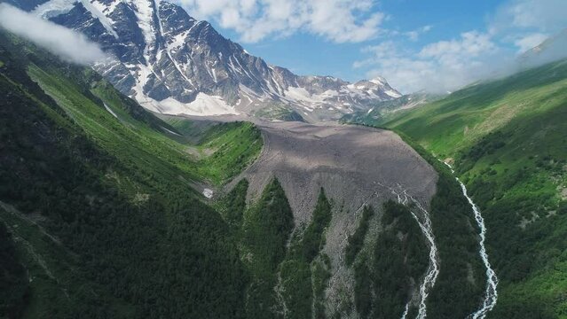 Aerial of Cheget mountain, North Caucasus. Picturesque snow capped peaks of Donguz Orun-Cheget-Karabashi in Elbrus region. Breathtaking summer landscape