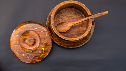 wooden pot. wooden utensils. wooden sugar pot. utensils. sugar pot. spoon. wooden bowl. wood pot with an open lid