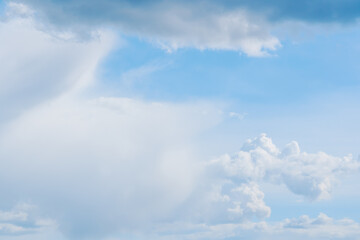 Naklejka na ściany i meble Cumulus clouds on a sunny day
