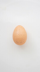 white and brown eggs on a white background