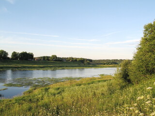summer river in the countryside in the evening