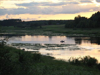 summer river in the countryside in the evening