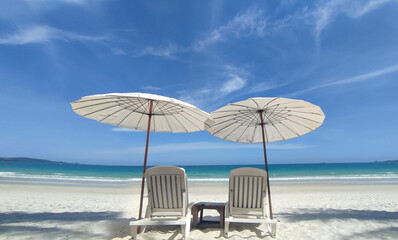 beach chairs and umbrella