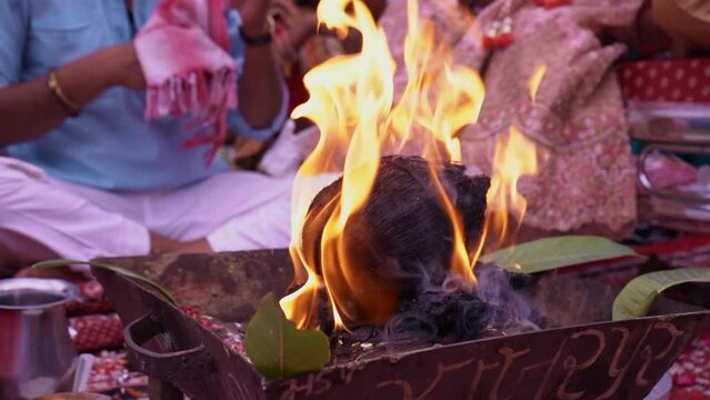 Closeup of flames of Havan kund, Indian Spiritual tradition to Worship god in Hinduism. Indian culture, Hindu Wedding rituals
