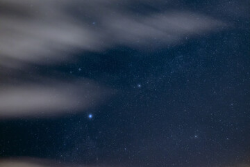 Naklejka na ściany i meble Milky Way stars and constellations on evening sky.