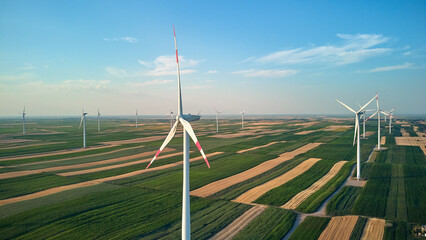 Windmill farm park and turbines for producing green electricity.