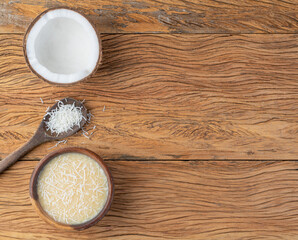 Creamy cocada, traditional brazilian coconut candy with grated coconut and copy space