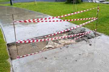 Warning or cordon tape to stop pedestrians. Red and white lines of barrier row tape prohibit...