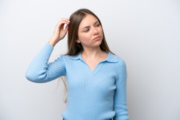 Young Lithuanian woman isolated on white background having doubts while scratching head