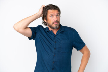 Senior dutch man isolated on white background with an expression of frustration and not...