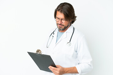 Senior dutch man isolated on white background wearing a doctor gown and holding a folder