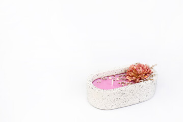 Decorative candle. On a white background.