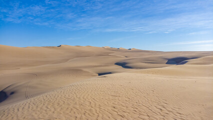 Huacachina is a desert oasis and a small village just west of the city of Ica in southwestern Peru