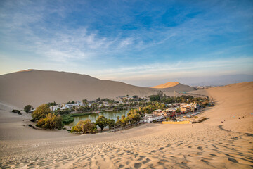 Huacachina is a desert oasis and a small village just west of the city of Ica in southwestern Peru