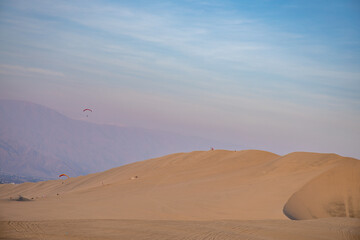 Fototapeta na wymiar Huacachina is a desert oasis and a small village just west of the city of Ica in southwestern Peru