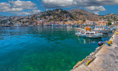 Naklejka na ściany i meble Symi harbour, Greece, with colorful neoclassical mansions