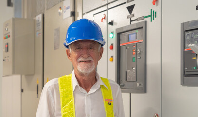 An old elderly engineer man or worker, people talking on webcam video call conference, working in...