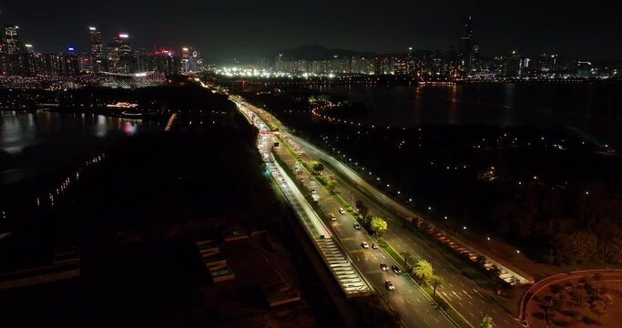 Aerial footage of landscape at night in shenzhen city, China, Hyperlapse