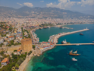 View of the Kizil Kule by the Mediterranean Sea in Alanya, Turkey. The Red Tower is a popular tourist attraction in Turkey.