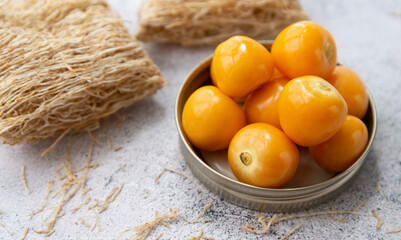 Golden berries with wheat cereal, close up
