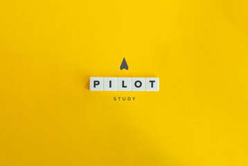 Pilot Study, Pilot Project or Pilot Experiment Banner and Concept. Block Letter Tiles on Yellow Background. Minimal Aesthetics.
