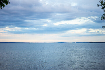 Seascape sunset view. Nature, cloudy sky