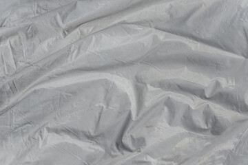 White wrinkled fabric as a background.