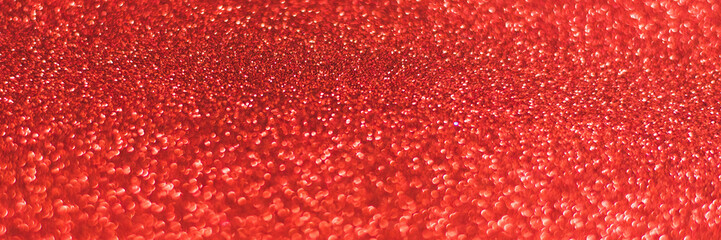 Red shiny background with sparkles. Abstract holiday background. Web banner