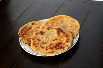 indian gujarati traditional dish food bhakhri or roti  can serve with masala curry