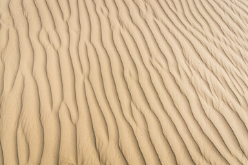 Clean pattern of fine sand in a desert