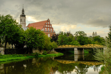 Fototapeta na wymiar old bridge over the river in Opole