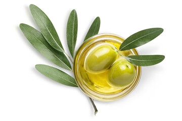 Two olives in oil with leaves, isolated on white background