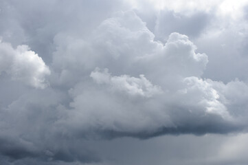 Natural backdrop with dark storm clouds on sky 