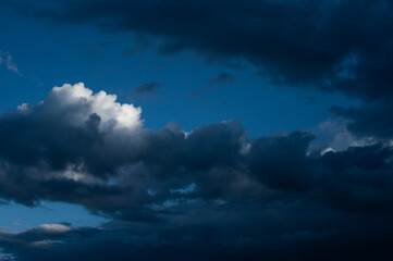 Naklejka na ściany i meble Scenic shot of dramatic sky with rainy clouds, natural backdrop 
