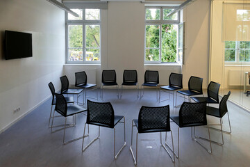 Small seminar room with chairs placed in a circle