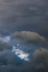 Fototapeta na wymiar Scenic shot of dramatic sky with rainy clouds, natural backdrop 