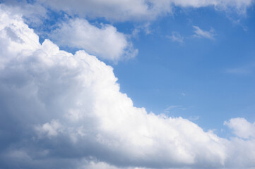 Scenic view of blue sky with white cumulus clouds, natural background